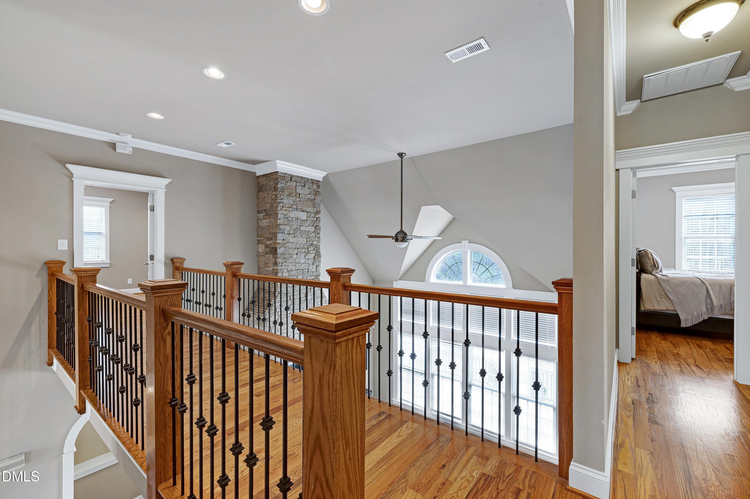 14212 Careme Court Wake Forest, NC 27587 - Photo 24 of 54 a view of entryway and hall with wooden floor