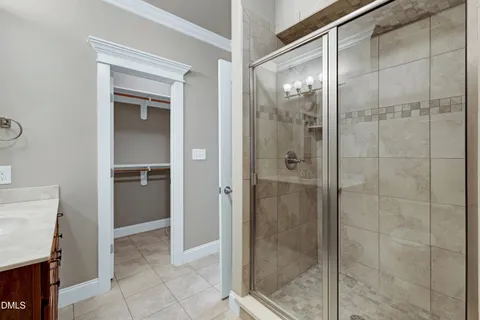 a bathroom with a bathtub and shower