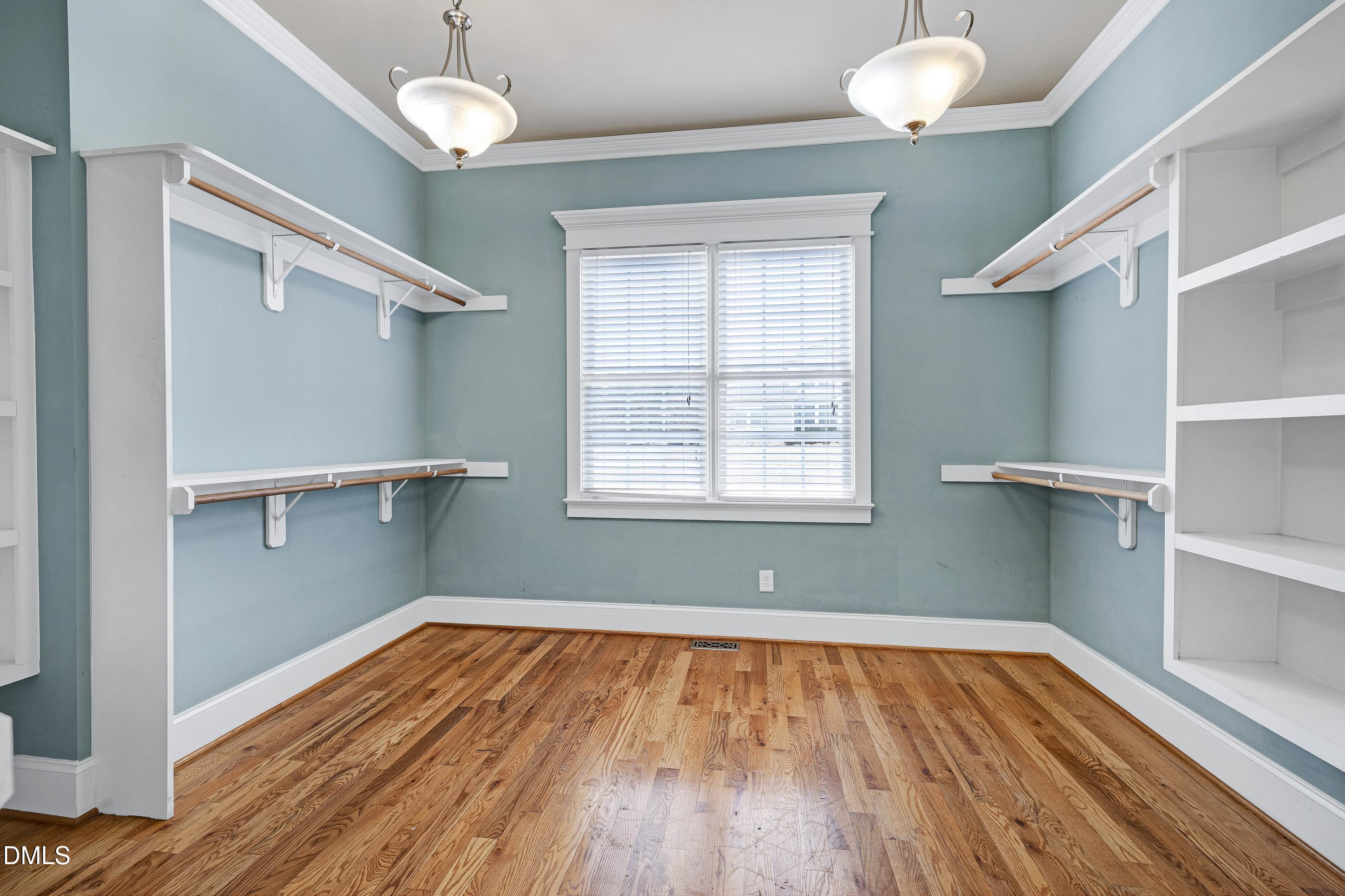 14212 Careme Court Wake Forest, NC 27587 - Photo 41 of 54 wooden floor in an empty room with a window