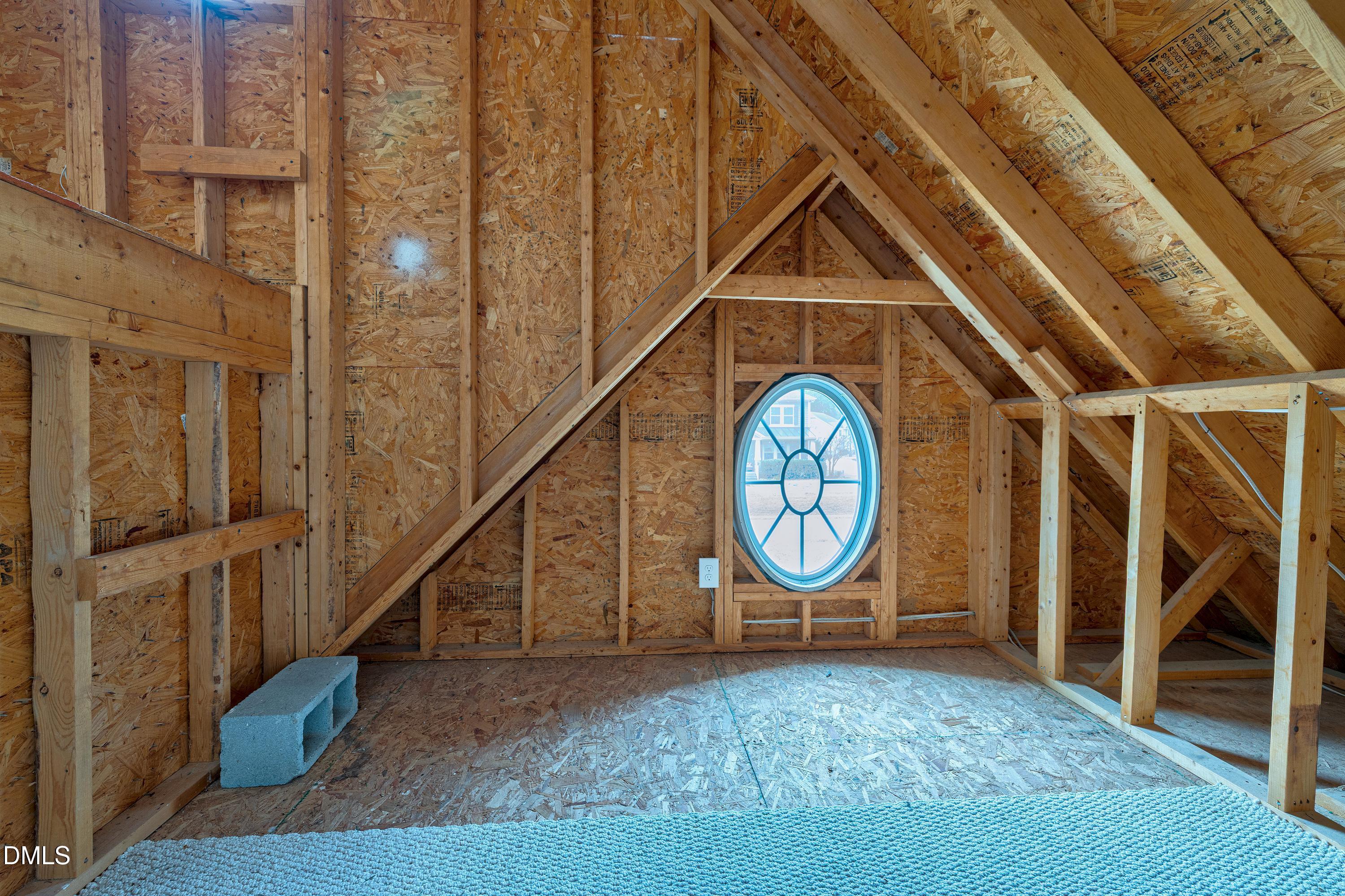 14212 Careme Court Wake Forest, NC 27587 - Photo 43 of 54 a view of a livingroom with wooden floor and stairs
