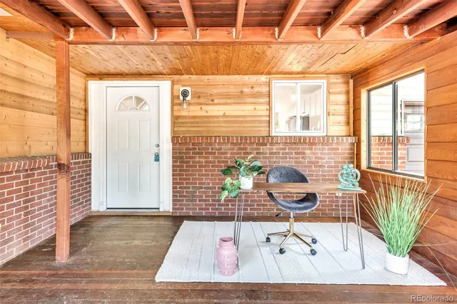 a living room with a couch and a table