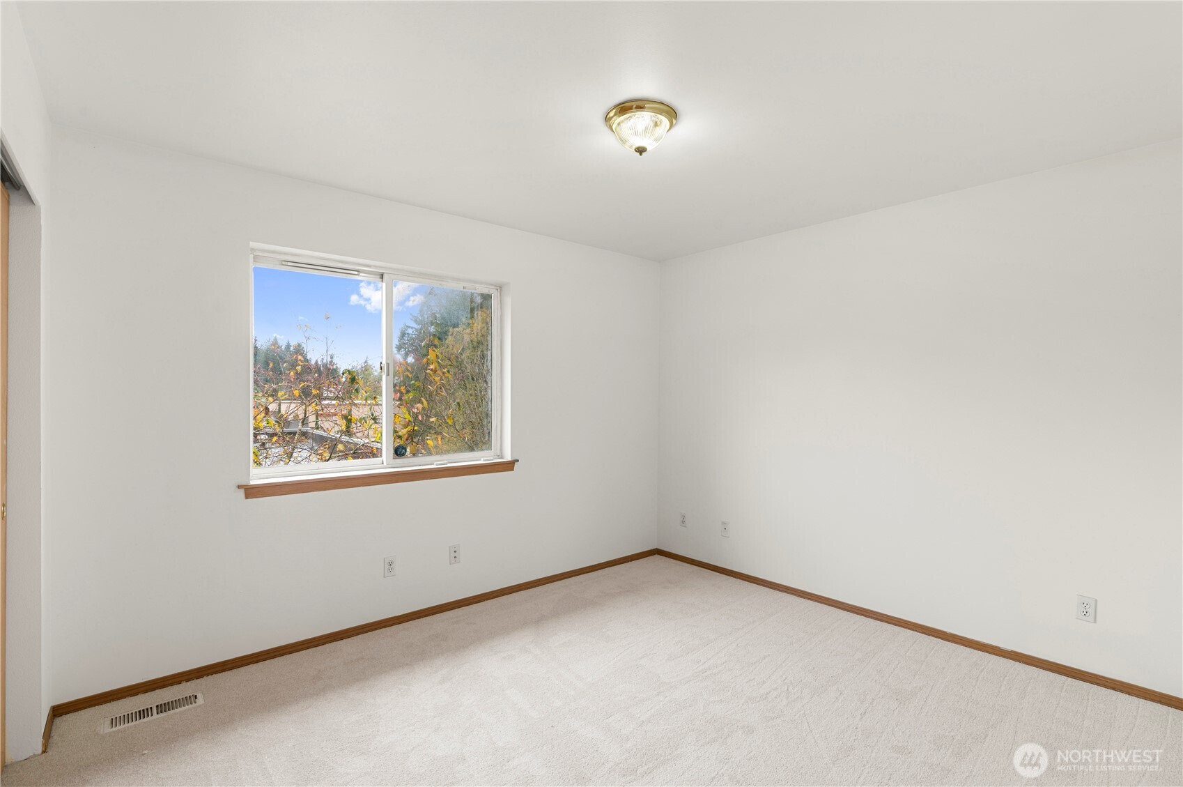 4733 Carlton Road Everett, WA 98203 - Photo 17 of 23 an empty room with a window