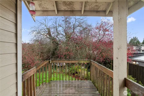 a view of balcony and yard