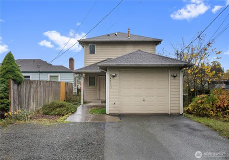 a view of a house with a garage