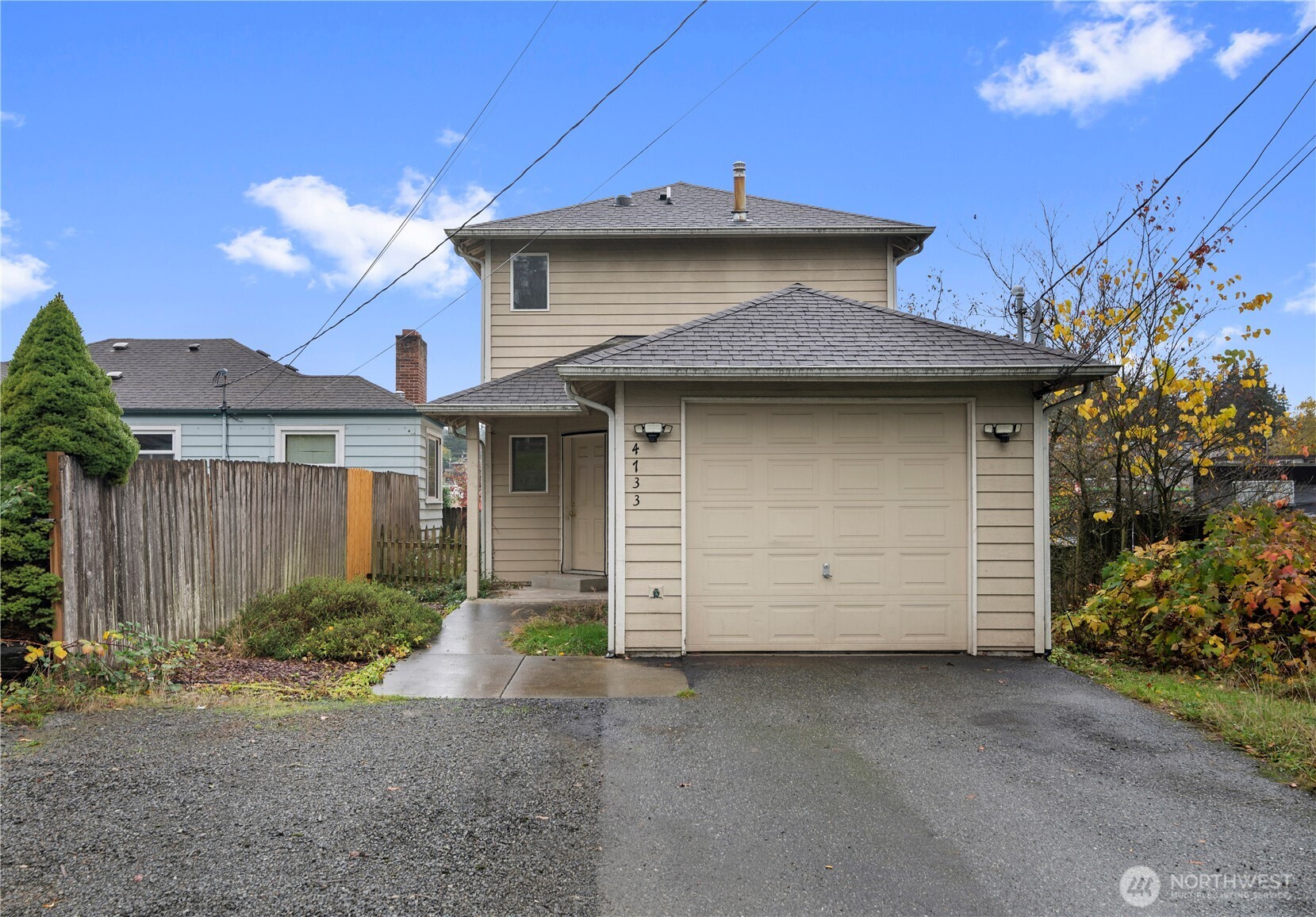 4733 Carlton Road Everett, WA 98203 - Photo 2 of 23 a view of a house with a garage