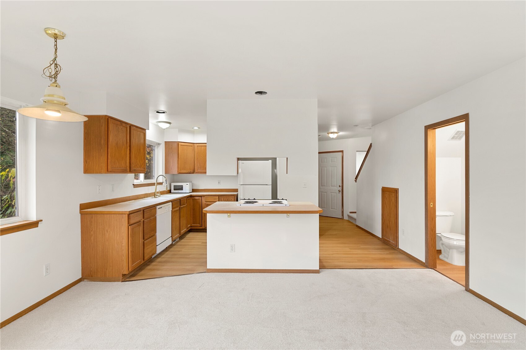 4733 Carlton Road Everett, WA 98203 - Photo 8 of 23 a kitchen with stainless steel appliances a refrigerator sink and stove