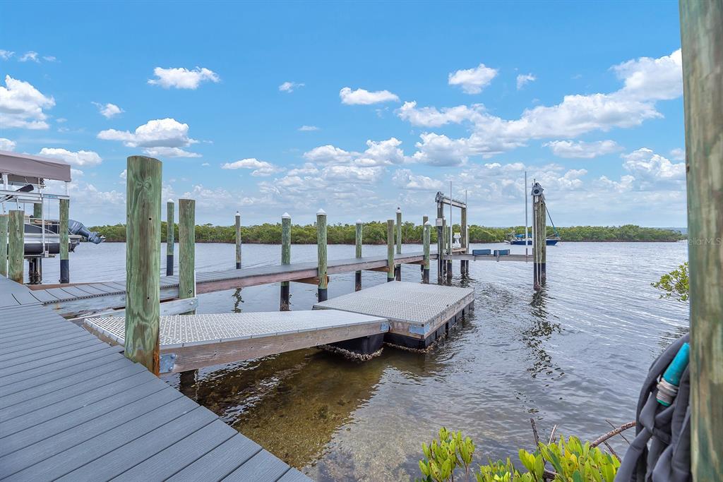 3304 West Shell Point Road Ruskin, FL 33570 - Photo 11 of 23 a view of a patio with couches table and chairs