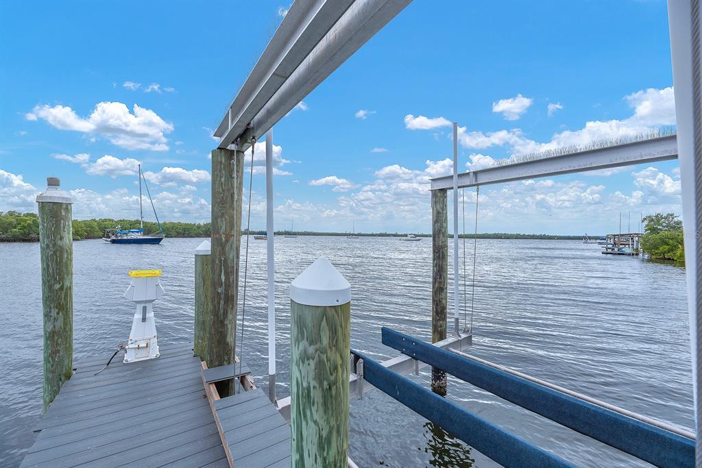3304 West Shell Point Road Ruskin, FL 33570 - Photo 14 of 23 a view of a balcony with a potted plant