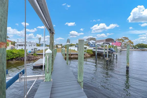 swimming pool view with a seating space