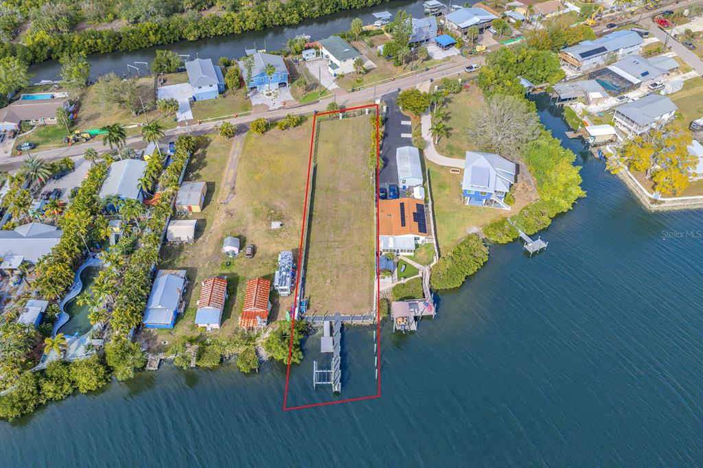 3304 West Shell Point Road Ruskin, FL 33570 - Photo 18 of 23 an aerial view of residential houses with outdoor space and swimming pool