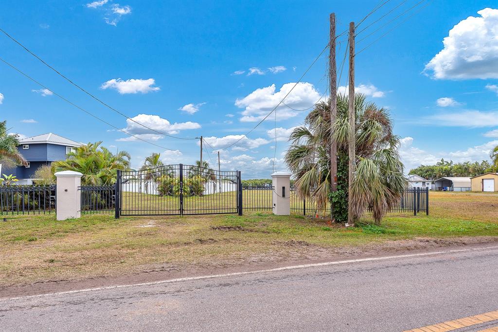 3304 West Shell Point Road Ruskin, FL 33570 - Photo 4 of 23 a view of a playground with a palm tree