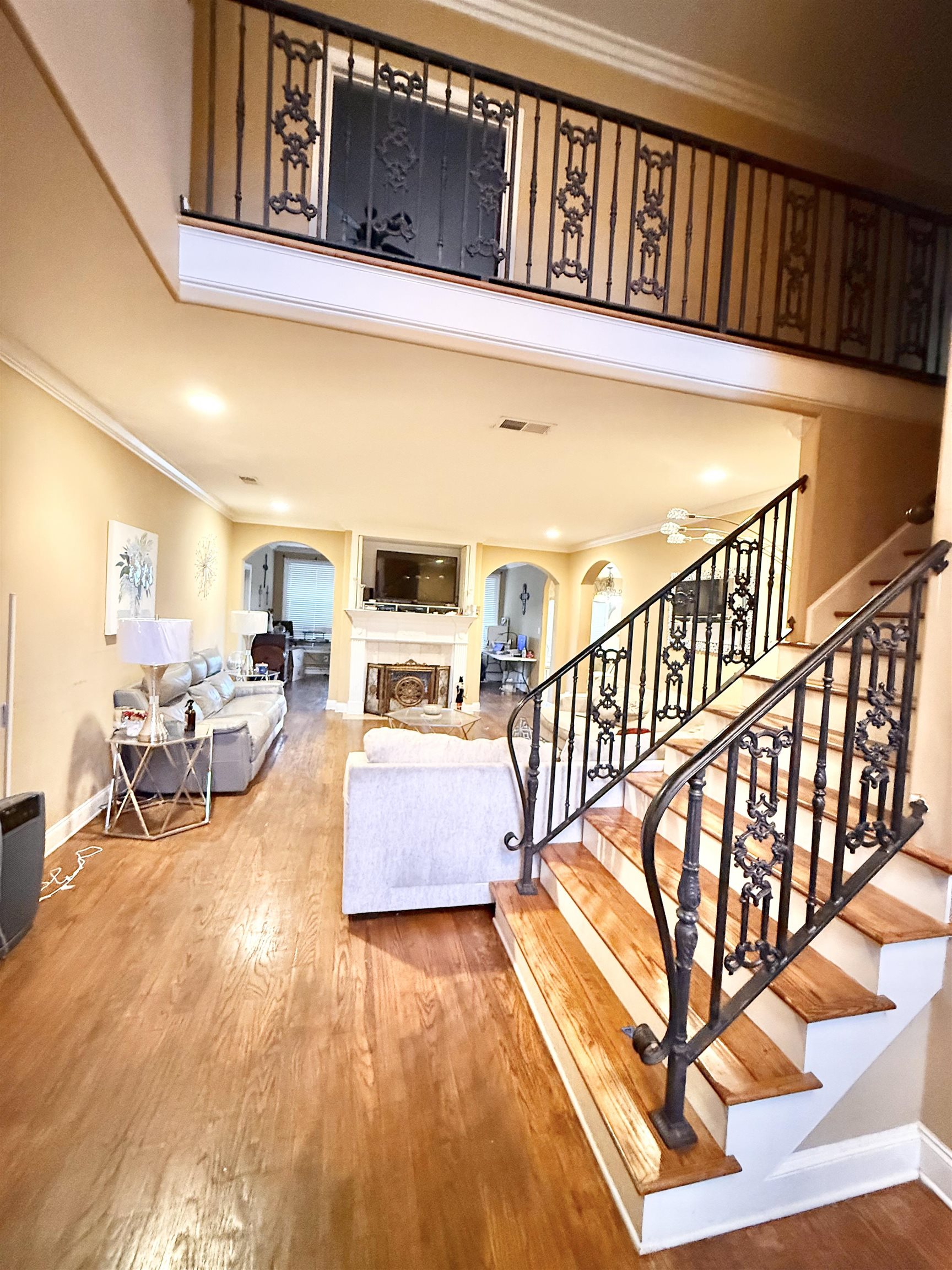 4447 Whisper Spring Drive Collierville, TN 38017 - Photo 2 of 4 a view of living room with dining room and wooden floor