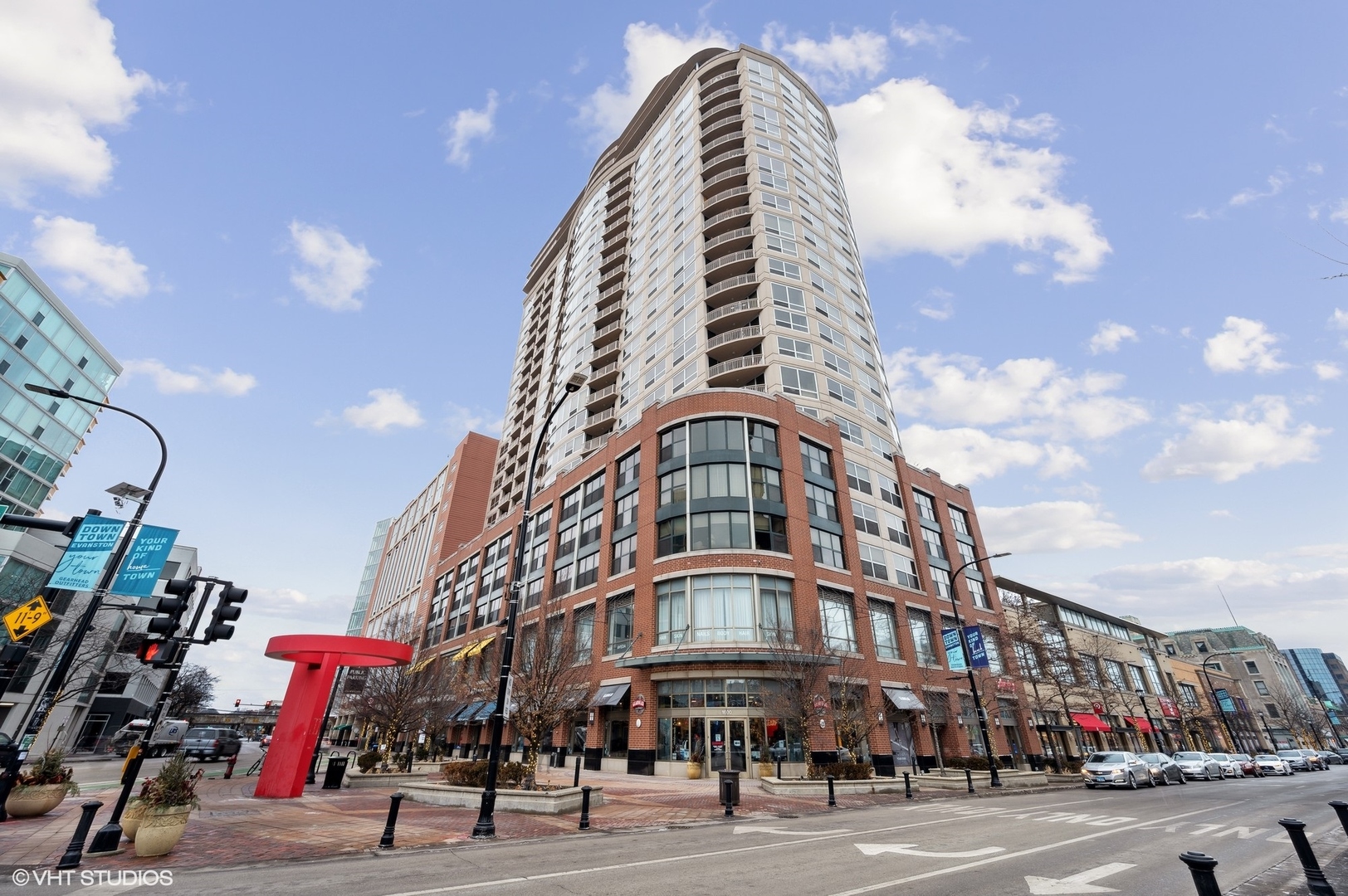 807 Davis Street, Unit 1610 Evanston, IL 60201 - Photo 1 of 19 a view of a tall building next to a road