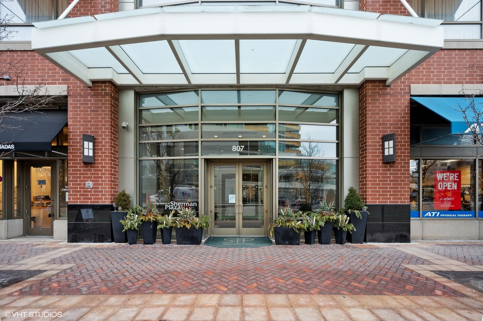 807 Davis Street, Unit 1610 Evanston, IL 60201 - Photo 2 of 19 a view of a building with a outdoor space