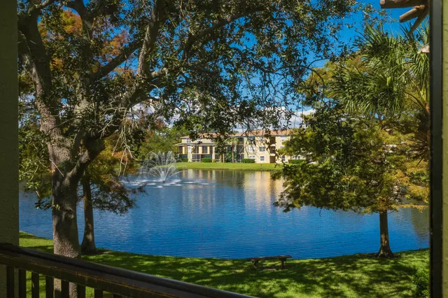 a bathroom with a sink a vanity and a mirror