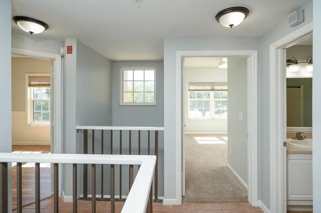 a bathroom with a sink toilet and vanity