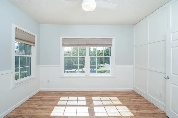 a view of a swimming pool with a lounge chair