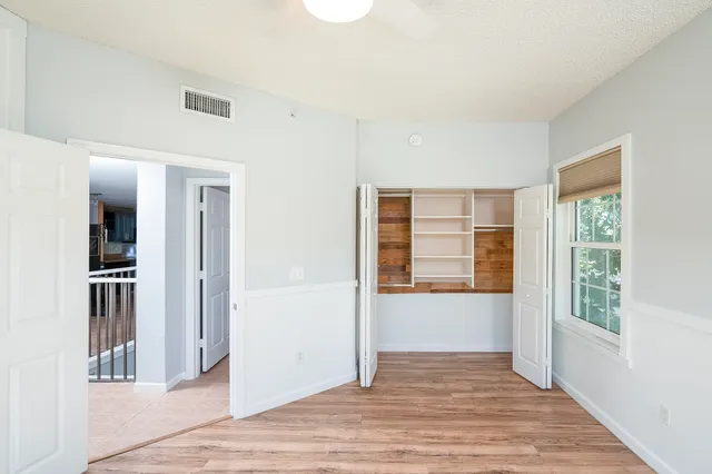 a view of a room with rack on the wall