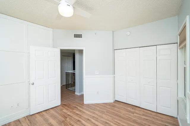 a view of storage and utility room with racks on the wall