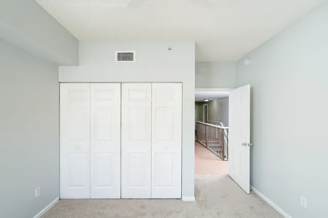a view of a swimming pool with an outdoor space and seating area