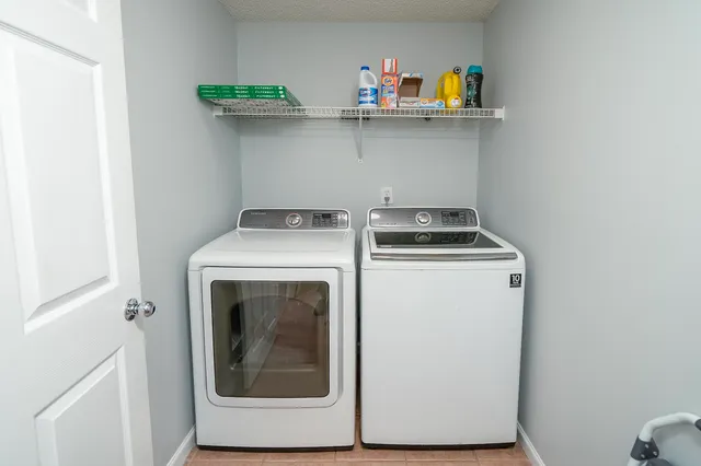 a view of a swimming pool with a lounge chairs