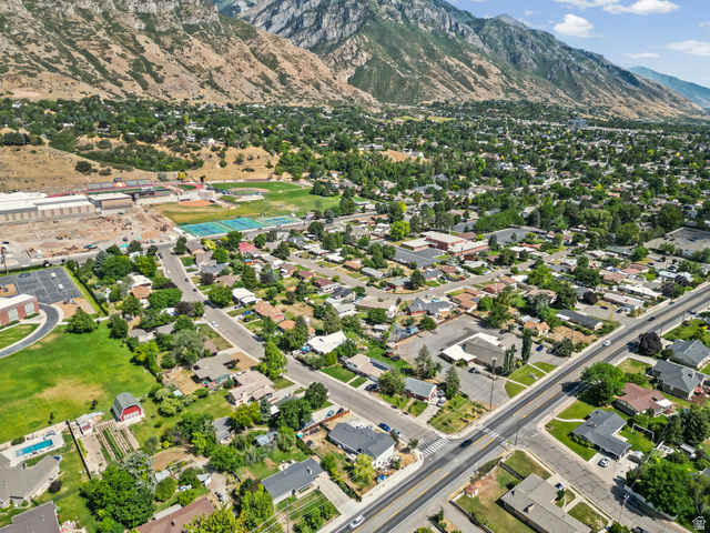542 East 3400th Street North Provo, UT 84604 - Photo 38 of 39 Expansive aerial showcasing a residential neighborhood with mountain backdrop