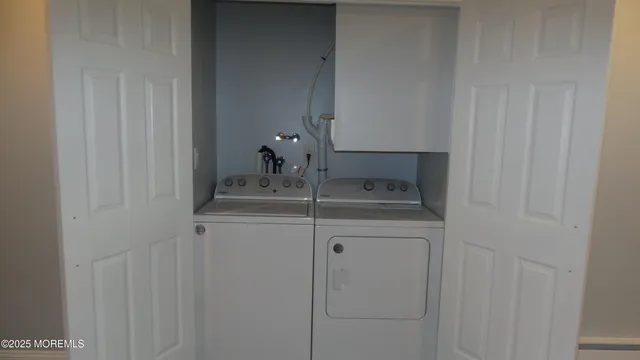 a bathroom with a sink and vanity