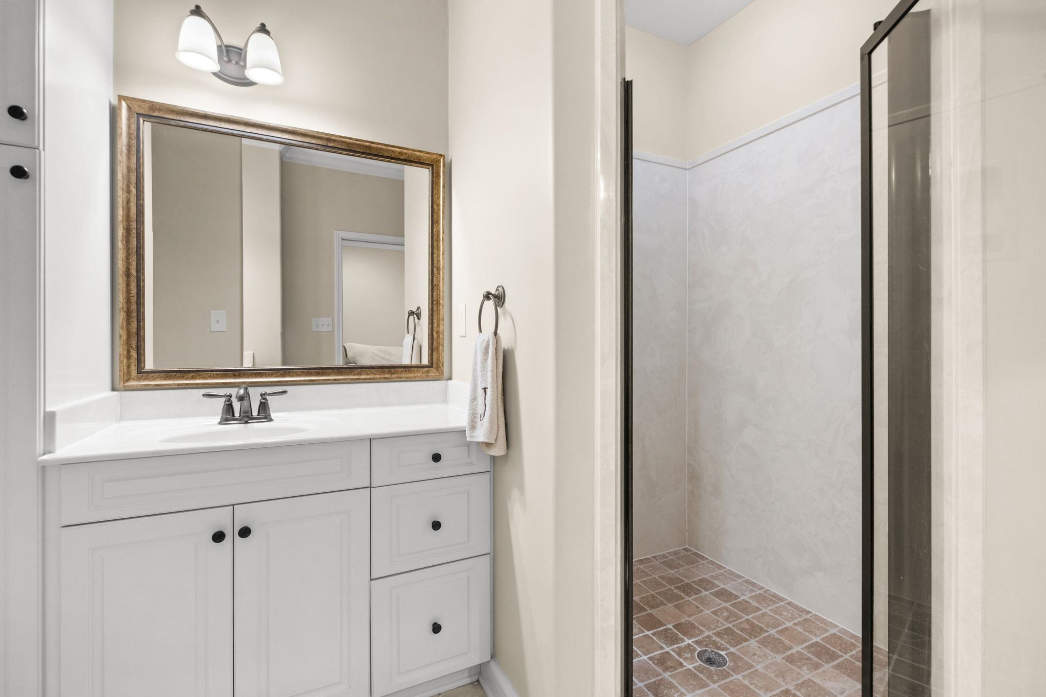 2275 McVay Road, Unit 2275 Germantown, TN 38138 - Photo 19 of 40 a bathroom with a sink and a mirror