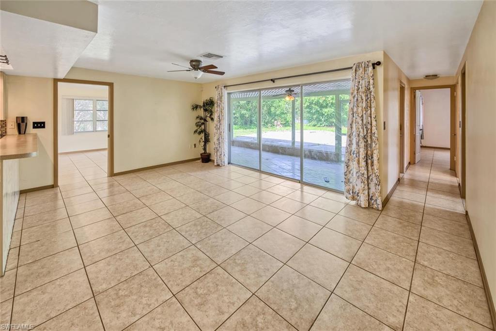 29 Caribbean Road Naples, FL 34108 - Photo 8 of 30 a view of empty room with wooden floor