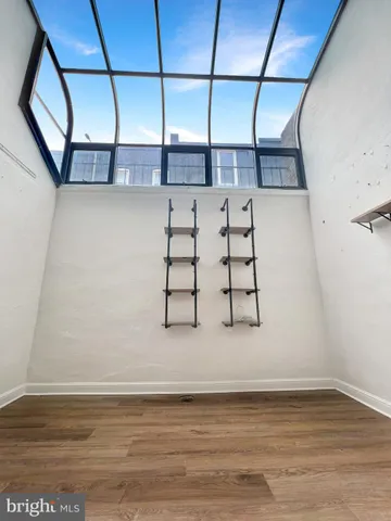 a view of a room with racks on the wall