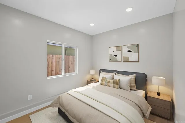a bathroom with a tub sink a mirror and a shower