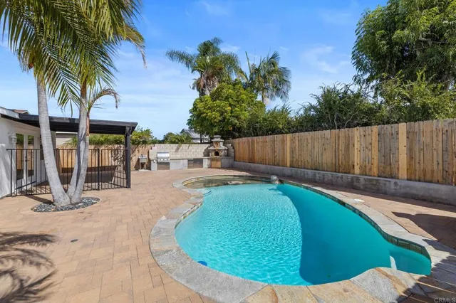 a view of a house with swimming pool