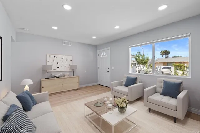 a living room with furniture and a couch