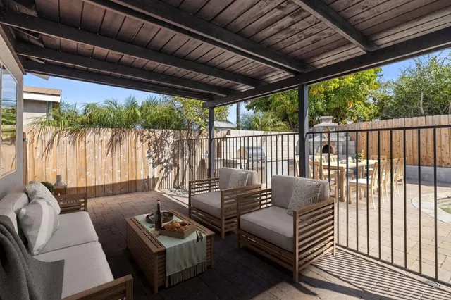 an aerial view of residential houses with green space