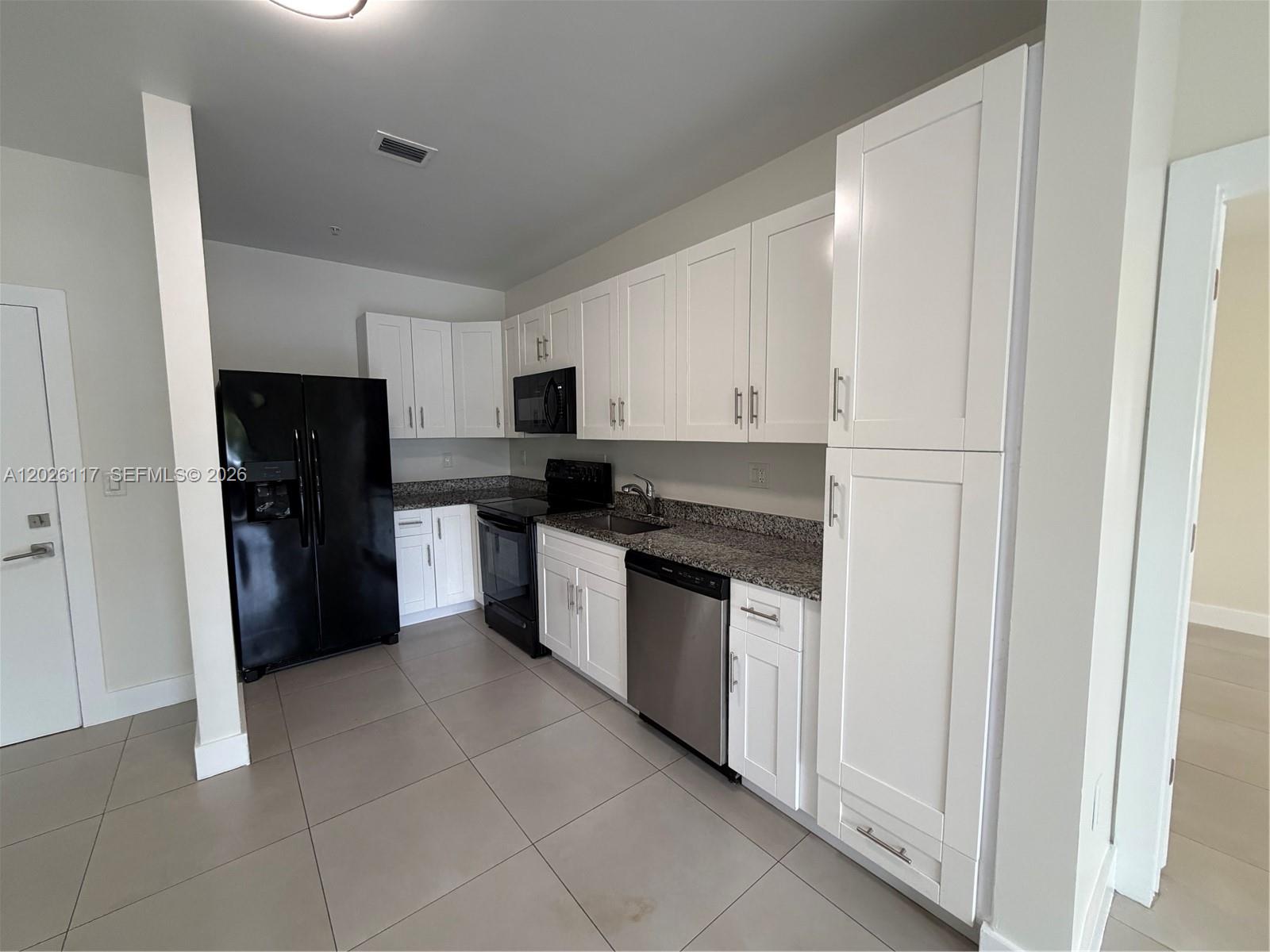 2425 Northwest 24th Avenue, Unit 103 Miami, FL 33142 - Photo 2 of 12
