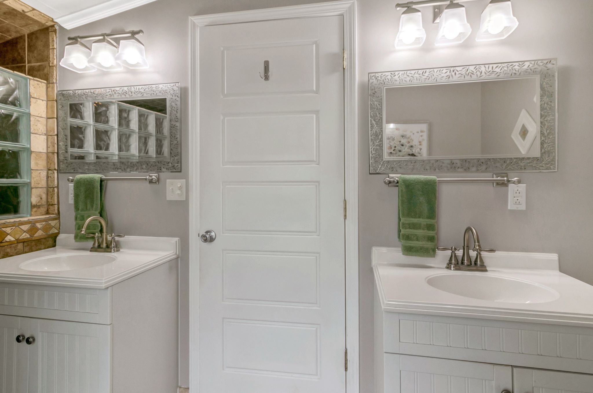 439 Bluff Road Big Sandy, TN 38221 - Photo 24 of 86 a bathroom with a sink vanity and a mirror