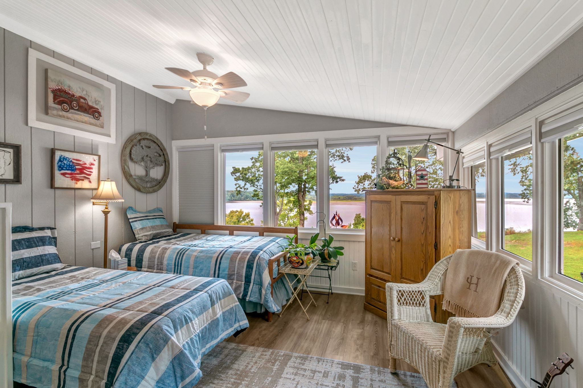 439 Bluff Road Big Sandy, TN 38221 - Photo 28 of 86 a bedroom with two beds and a large clock on the wall