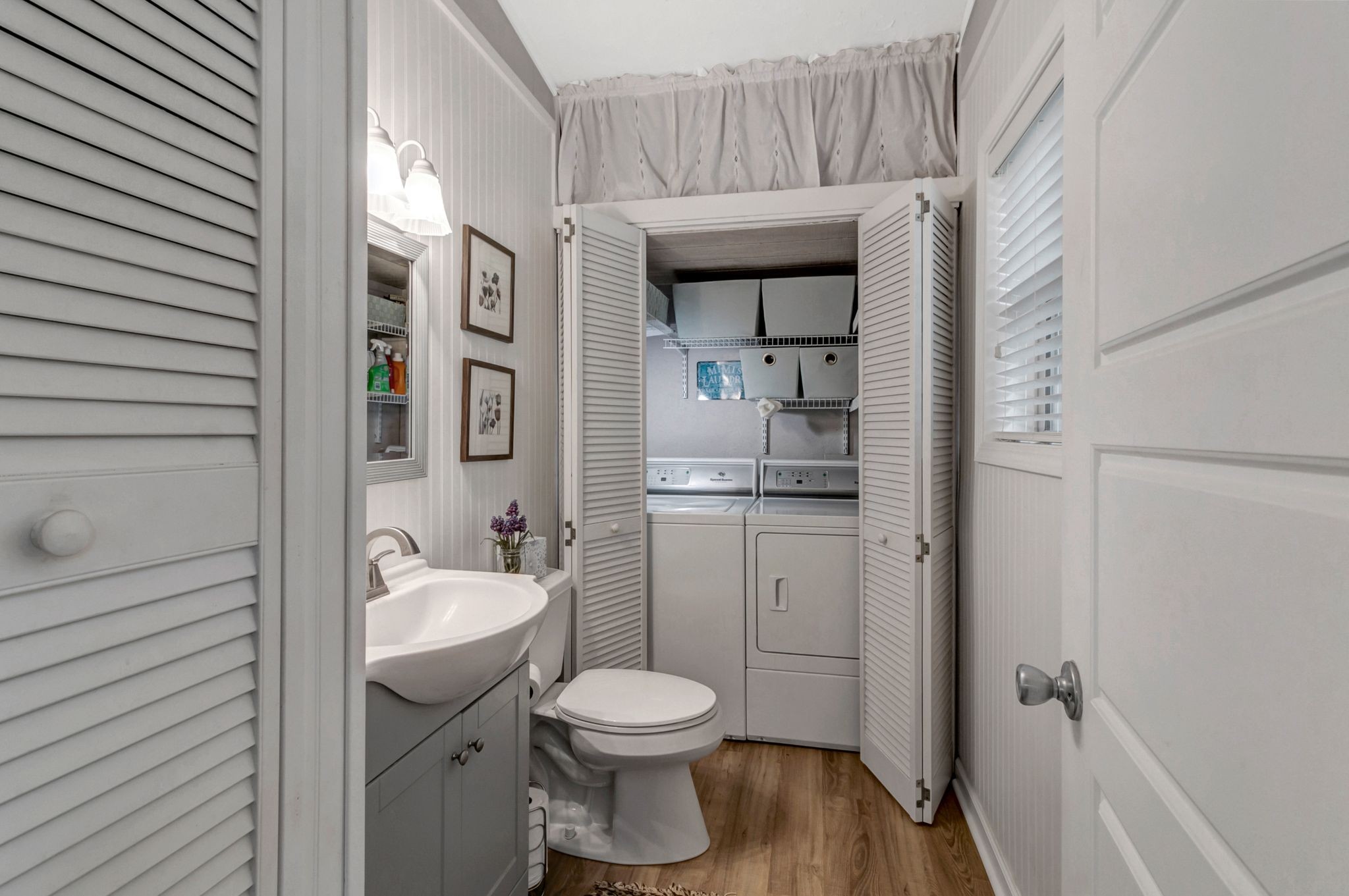439 Bluff Road Big Sandy, TN 38221 - Photo 31 of 86 a bathroom with a granite countertop sink toilet and shower