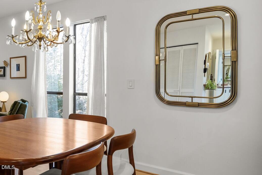 504 Waterside Drive Carrboro, NC 27510 - Photo 19 of 48 a dining room with furniture and window
