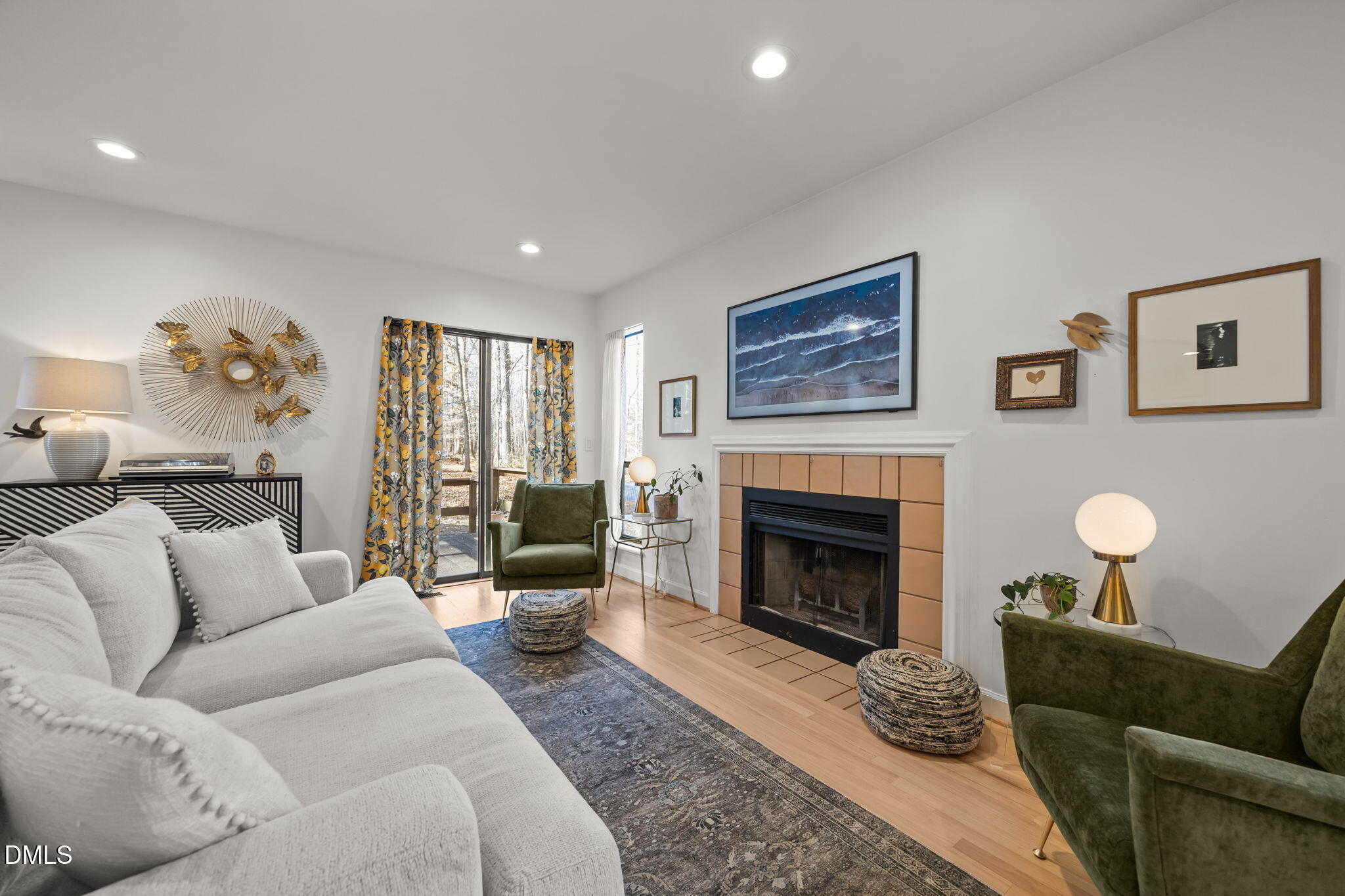 504 Waterside Drive Carrboro, NC 27510 - Photo 22 of 48 a living room with furniture and a fireplace