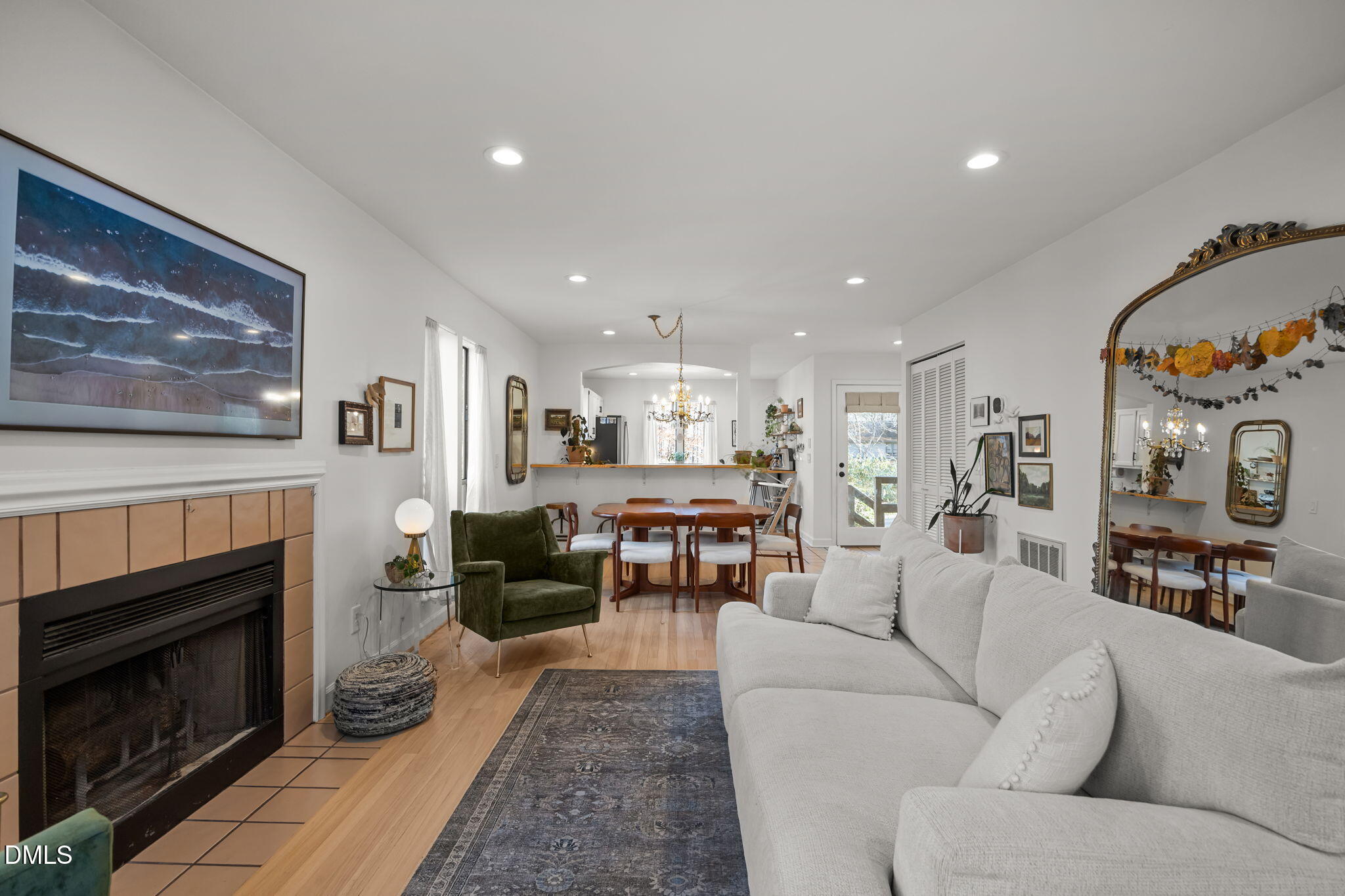 504 Waterside Drive Carrboro, NC 27510 - Photo 23 of 48 a living room with furniture and a fireplace