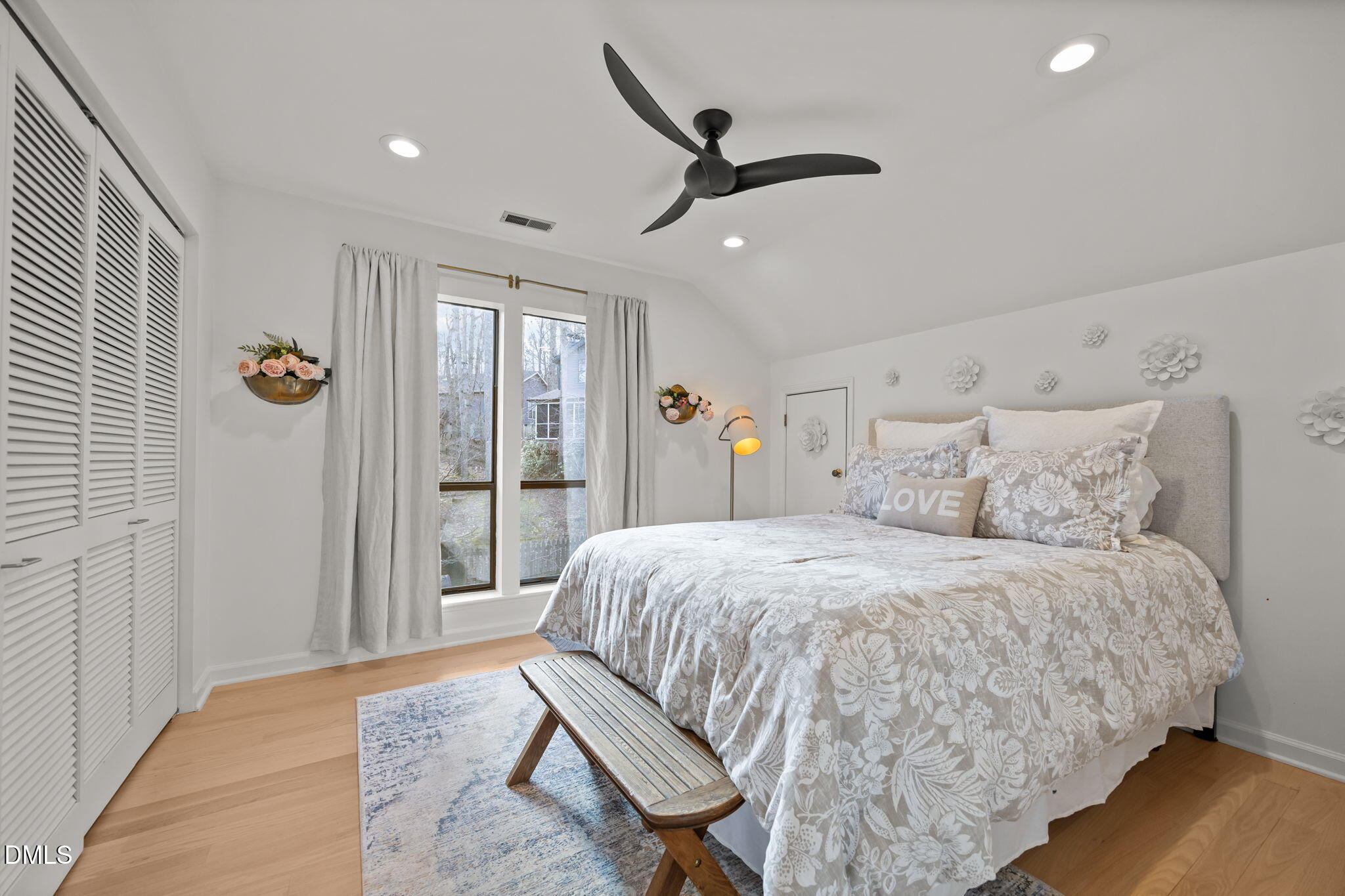 504 Waterside Drive Carrboro, NC 27510 - Photo 33 of 48 a bedroom with a large bed and a window