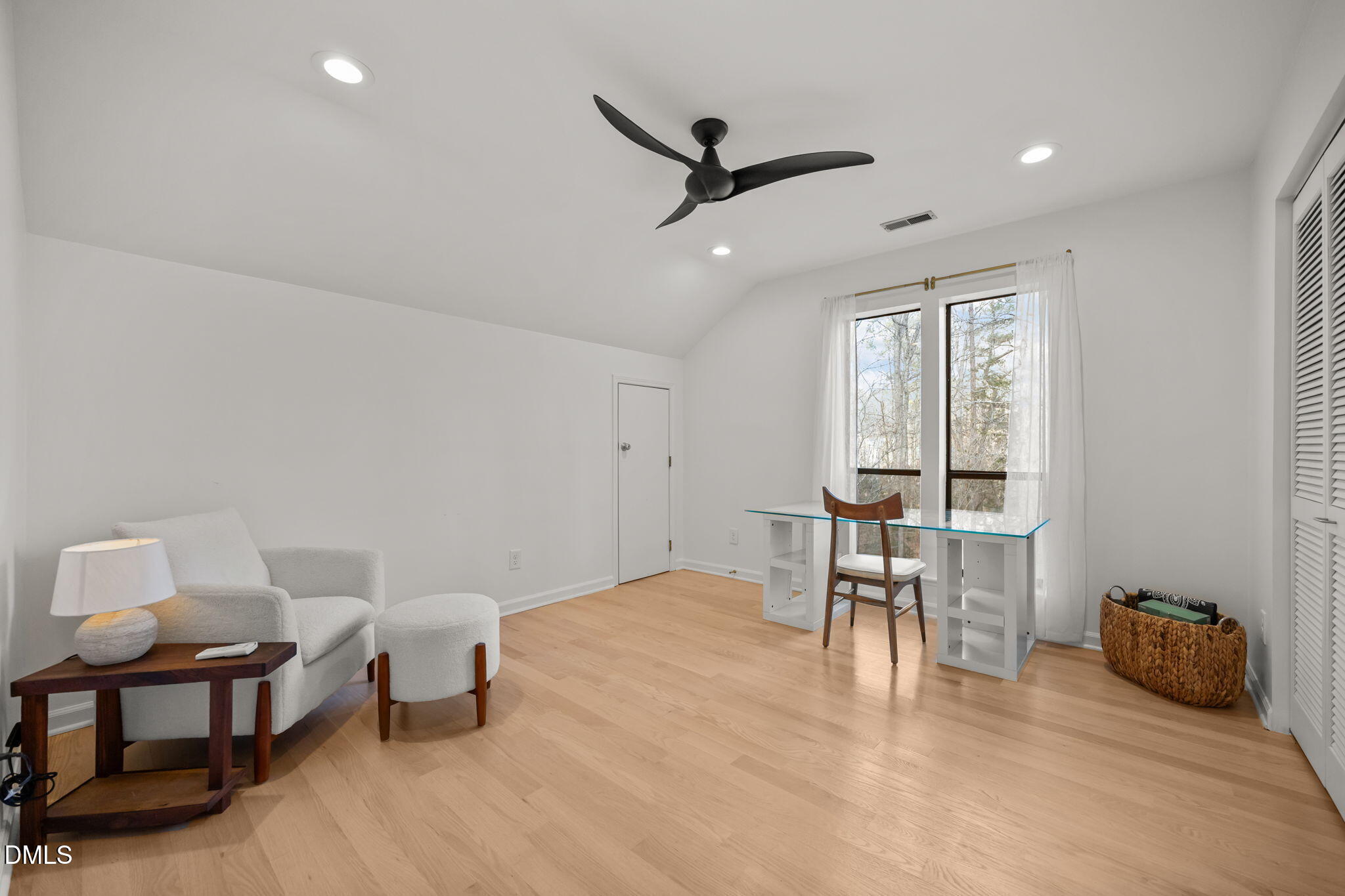 504 Waterside Drive Carrboro, NC 27510 - Photo 37 of 48 a living room with furniture a table and a window