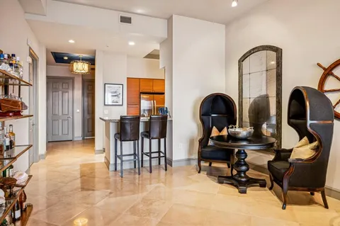 a view of a workspace with furniture