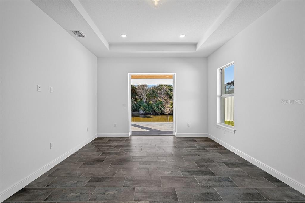 7 Crandon Court Palm Coast, FL 32137 - Photo 22 of 72 an empty room with windows