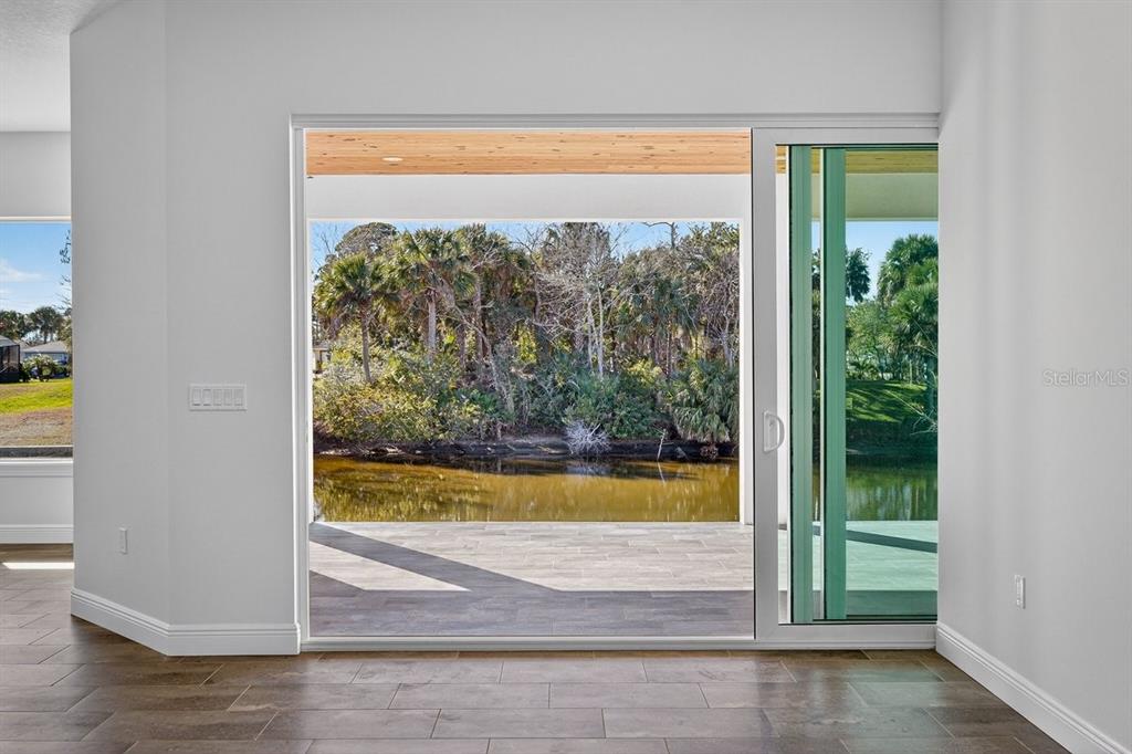 7 Crandon Court Palm Coast, FL 32137 - Photo 23 of 72 a view of swimming pool from a window