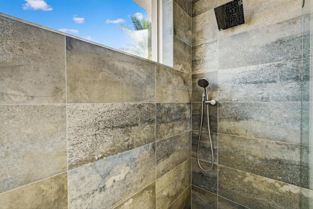 7 Crandon Court Palm Coast, FL 32137 - Photo 38 of 72 a bathroom with a shower