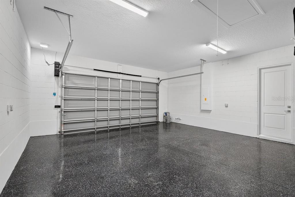 7 Crandon Court Palm Coast, FL 32137 - Photo 46 of 72 a view of an empty room with a fireplace