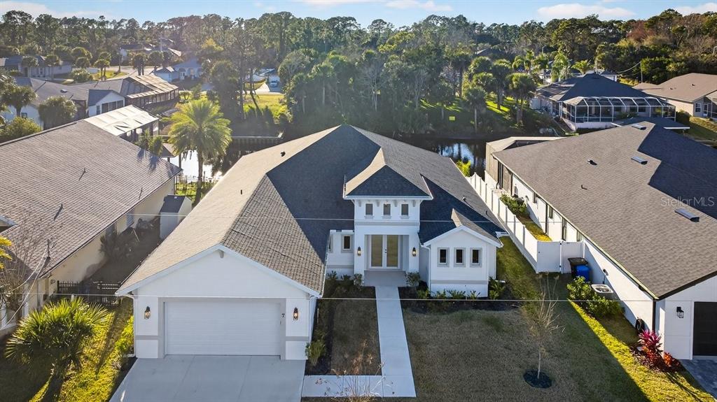 7 Crandon Court Palm Coast, FL 32137 - Photo 51 of 72 an aerial view of a house with a yard