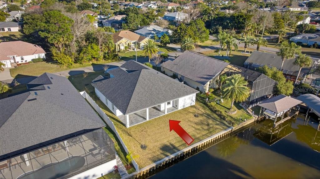 7 Crandon Court Palm Coast, FL 32137 - Photo 52 of 72 an aerial view of a house with a swimming pool